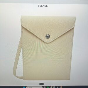 BNWT- Lemaire pocket cross body bag. Bone ivory. (Light cream)